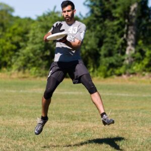 Mark Flores catching a frisbee